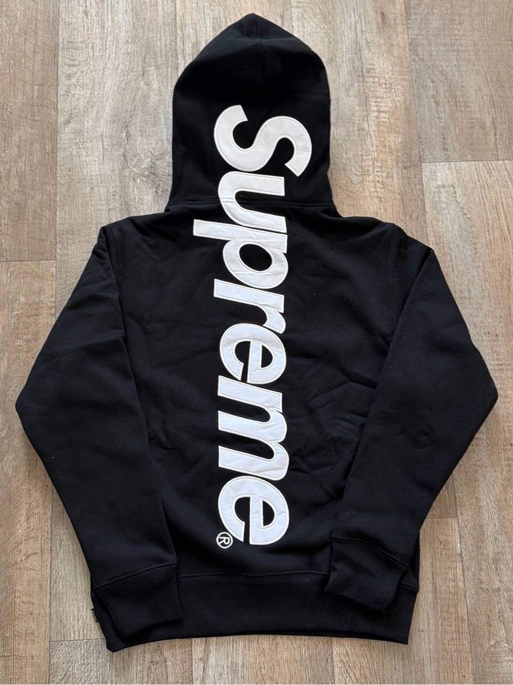 Supreme Black Hoodie with White Script Tag
